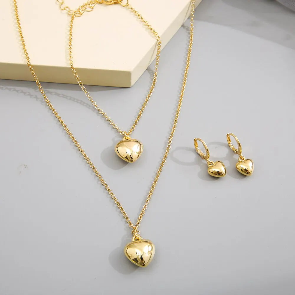 Ensemble de bijoux pour femmes, nouveau Style créatif de tempérament Simple, boucles d'oreilles et collier en alliage, cœur de pêche