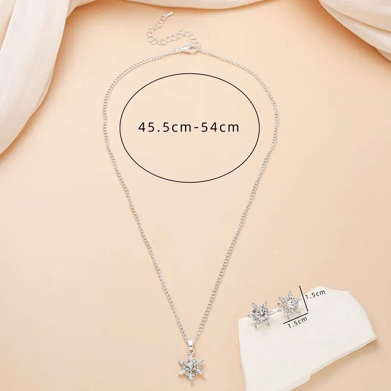 Ensemble de bijoux en cristal en forme de flocon de neige, collier et boucles d'oreilles couleur argent en alliage de Zinc pour femmes, fête de mariage, luxe, Style romantique