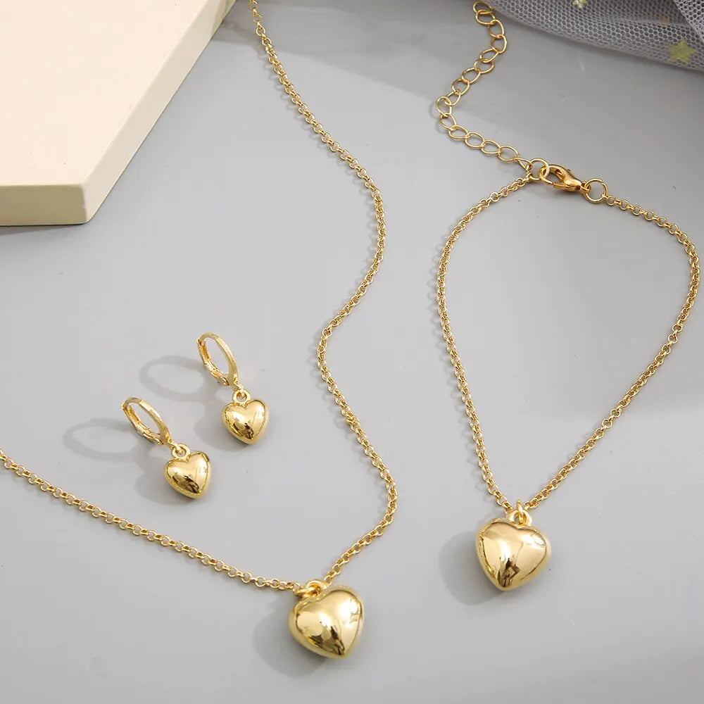 Ensemble de bijoux pour femmes, nouveau Style créatif de tempérament Simple, boucles d'oreilles et collier en alliage, cœur de pêche
