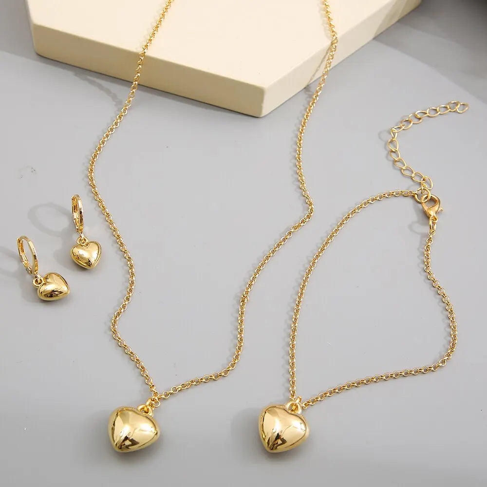 Ensemble de bijoux pour femmes, nouveau Style créatif de tempérament Simple, boucles d'oreilles et collier en alliage, cœur de pêche
