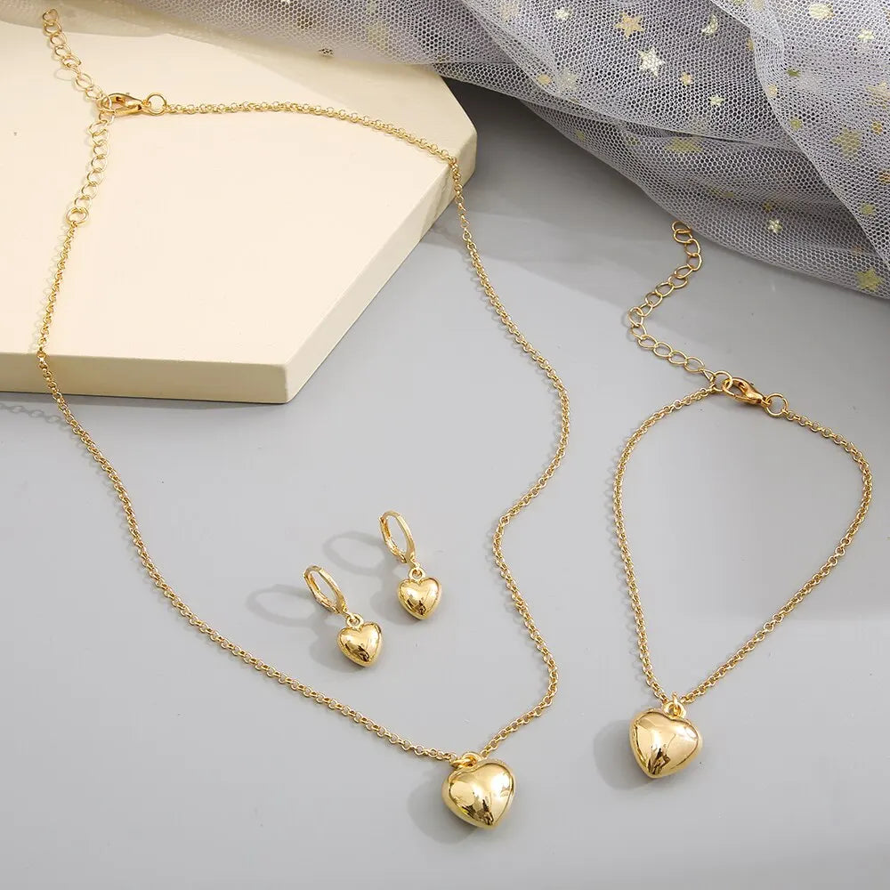 Ensemble de bijoux pour femmes, nouveau Style créatif de tempérament Simple, boucles d'oreilles et collier en alliage, cœur de pêche