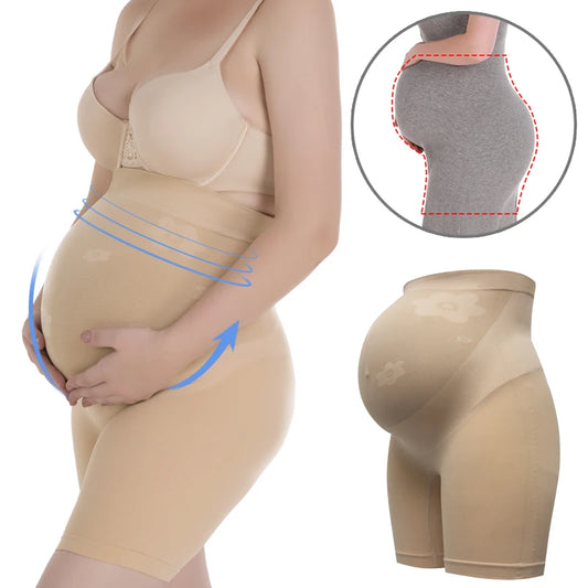 Culotte gainante maternité sans couture, offrant un soutien au ventre pour les femmes enceintes. Ce short de maintien taille haute affine la silhouette et peut être porté sous une robe ou un legging.