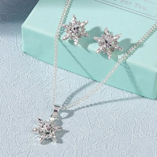 Ensemble de bijoux en cristal en forme de flocon de neige, collier et boucles d'oreilles couleur argent en alliage de Zinc pour femmes, fête de mariage, luxe, Style romantique